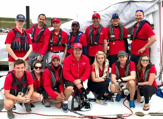 Some of the US 42 sailors in their red uniforms gathered before the intramural race on Saturday in Newport Harbor © Manhattan Yacht Club